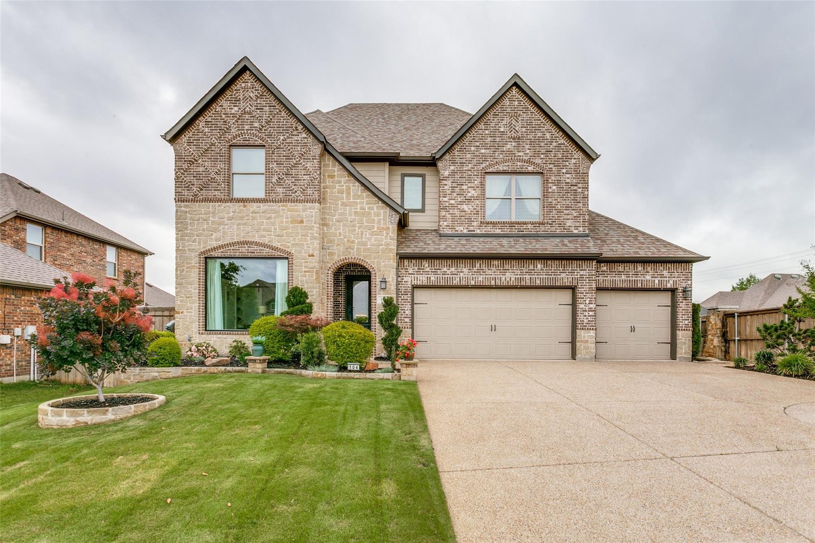 104 Martingale Trl, Oak Point TX - front exterior of the home for sale