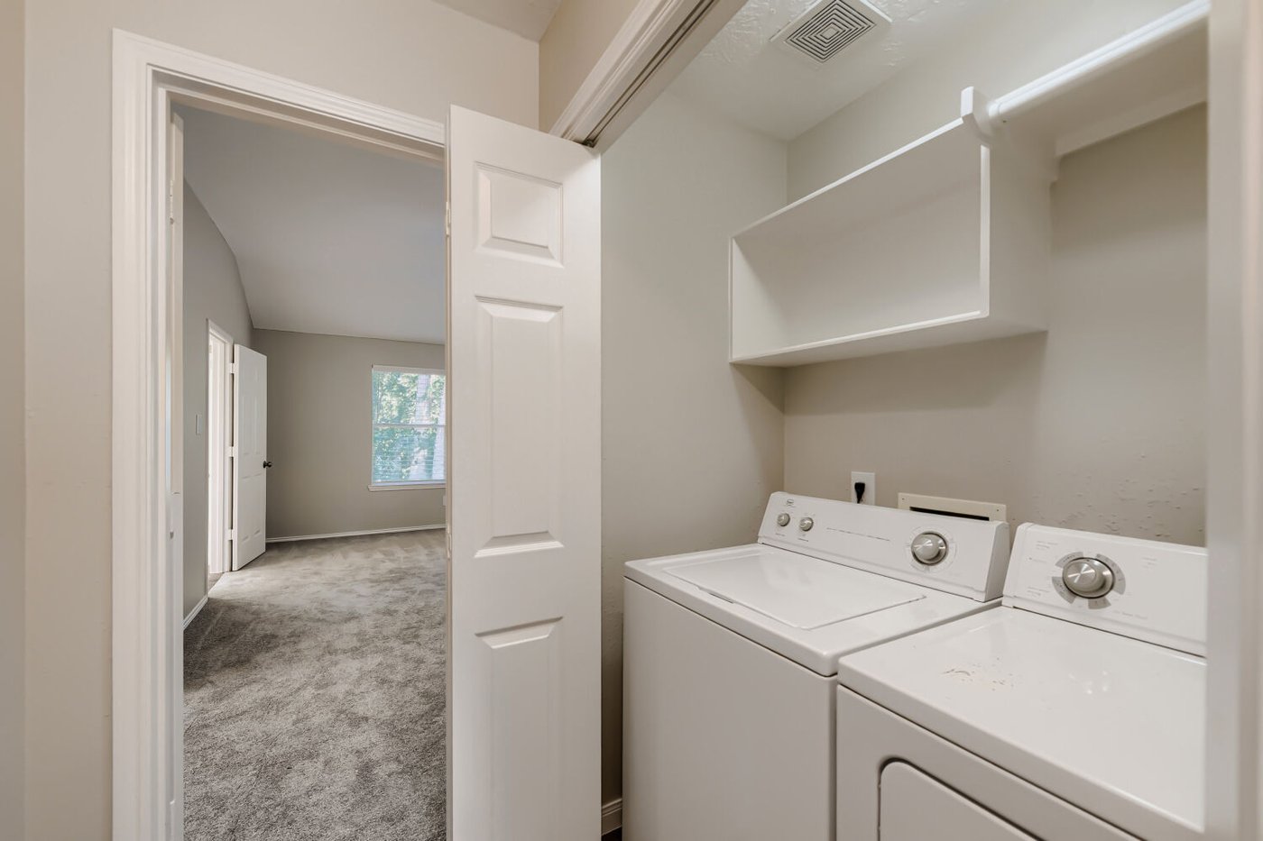 Separate laundry room at 11 Wineberry Pl, The Woodlands