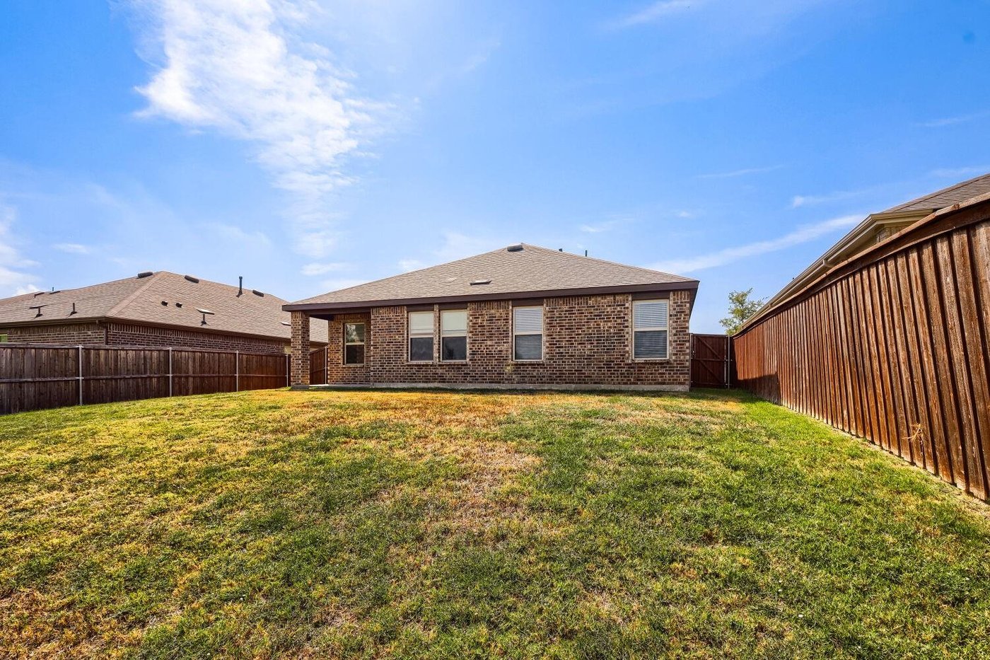 Fenced backyard at 1212 Rountree Ct, Celina