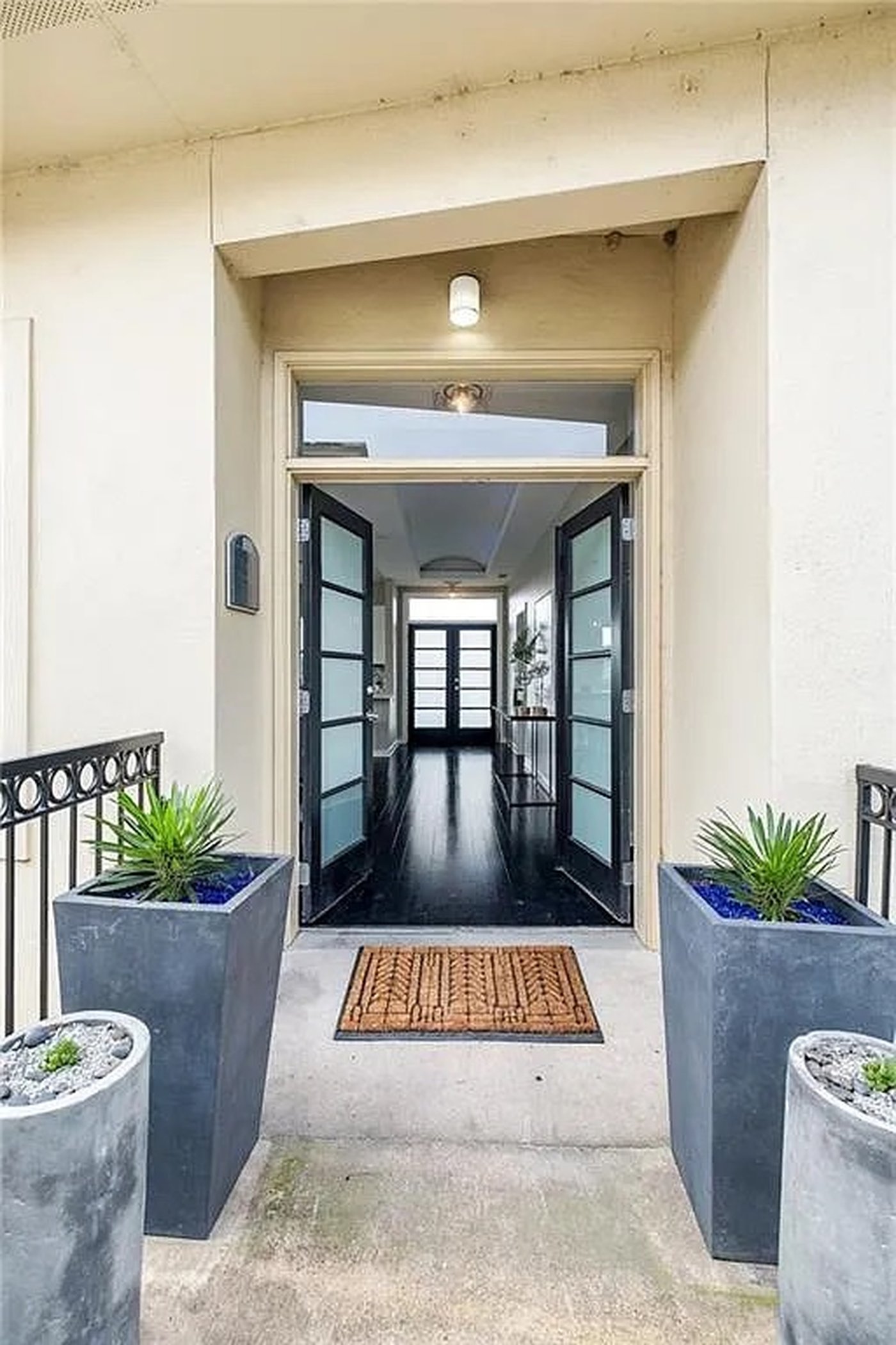 Entry foyer with elevator and stair access at 1310 S 1st St #310 Austin condo