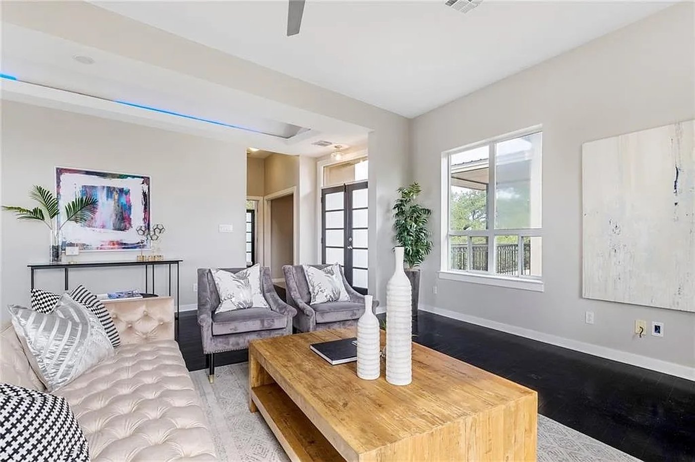 Bright open concept living area with downtown views at 1310 S 1st St #310 Austin