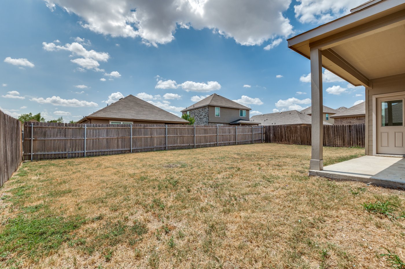 Covered back patio at 1403 Kinglet Dr, Ennis