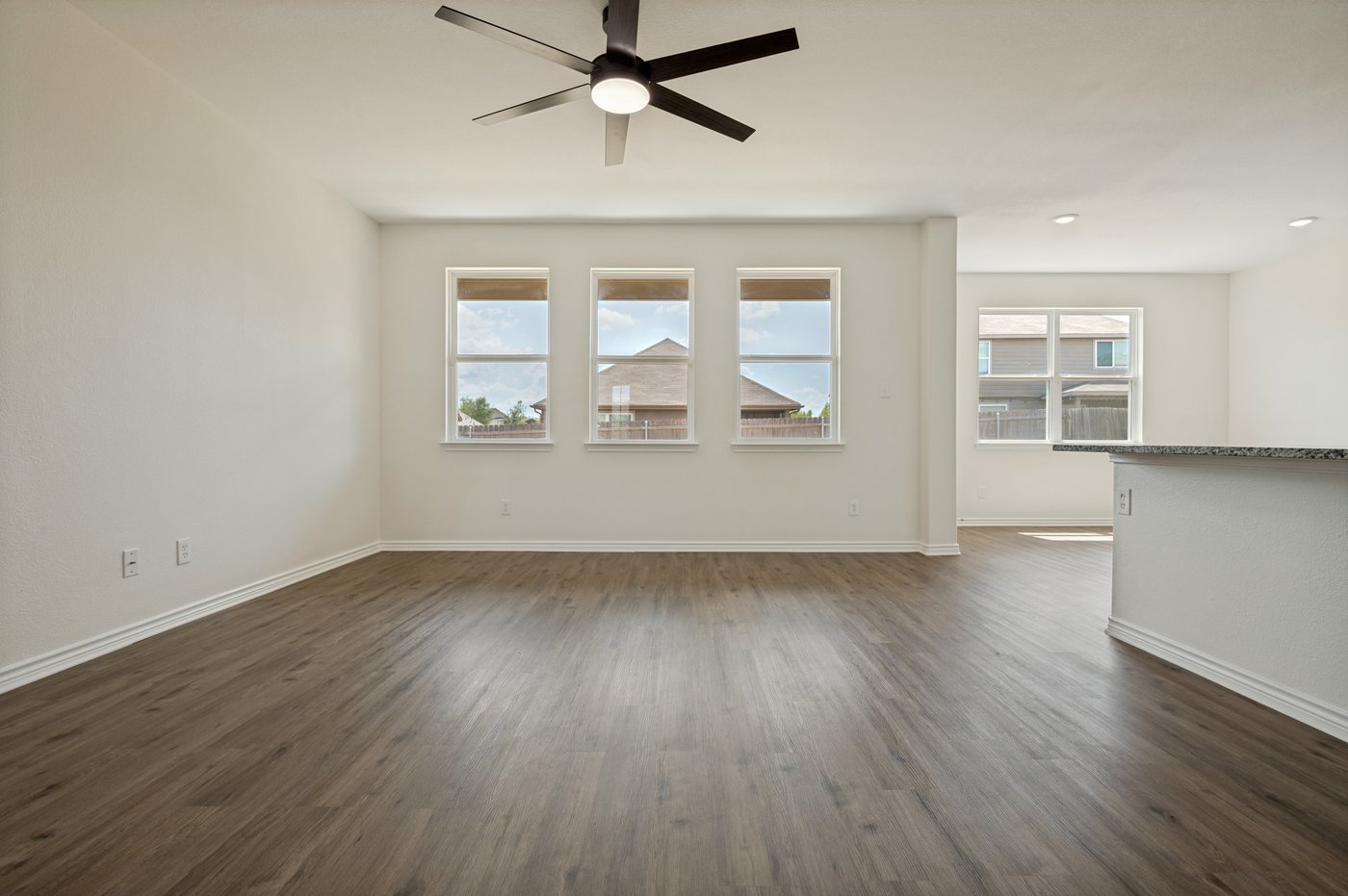 Dining area open to the living room at 1403 Kinglet Dr, Ennis