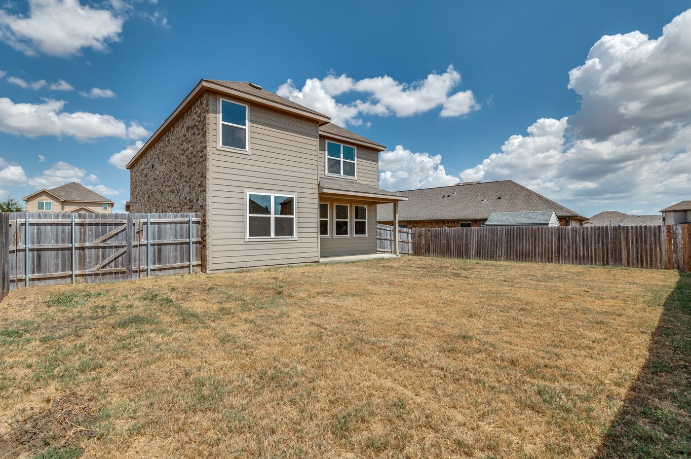 Rear exterior view of 1403 Kinglet Dr, Ennis