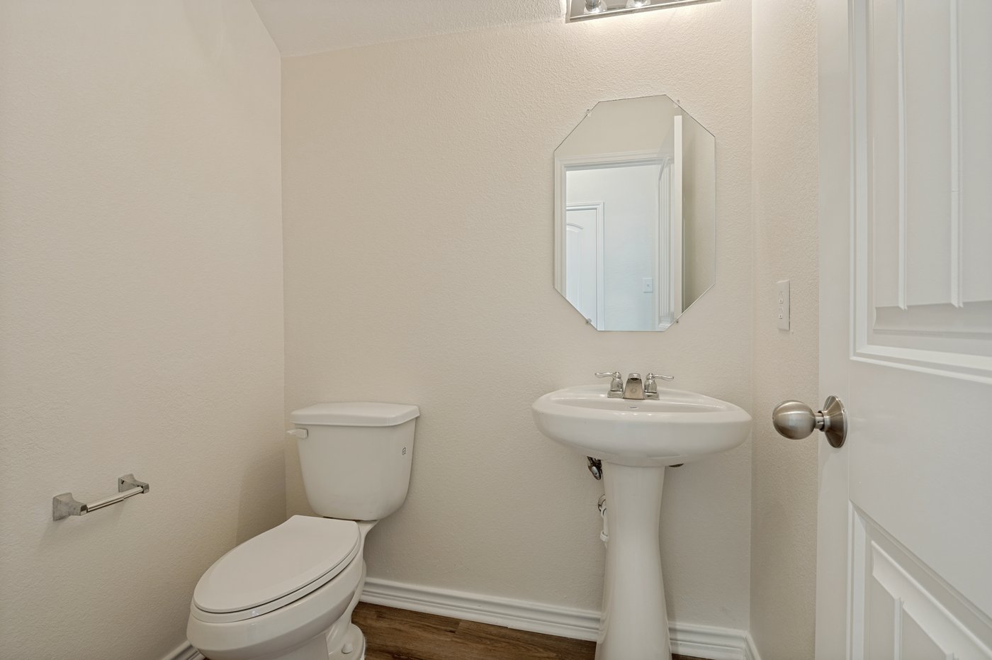 Convenient half bath on the main level at 1403 Kinglet Dr, Ennis