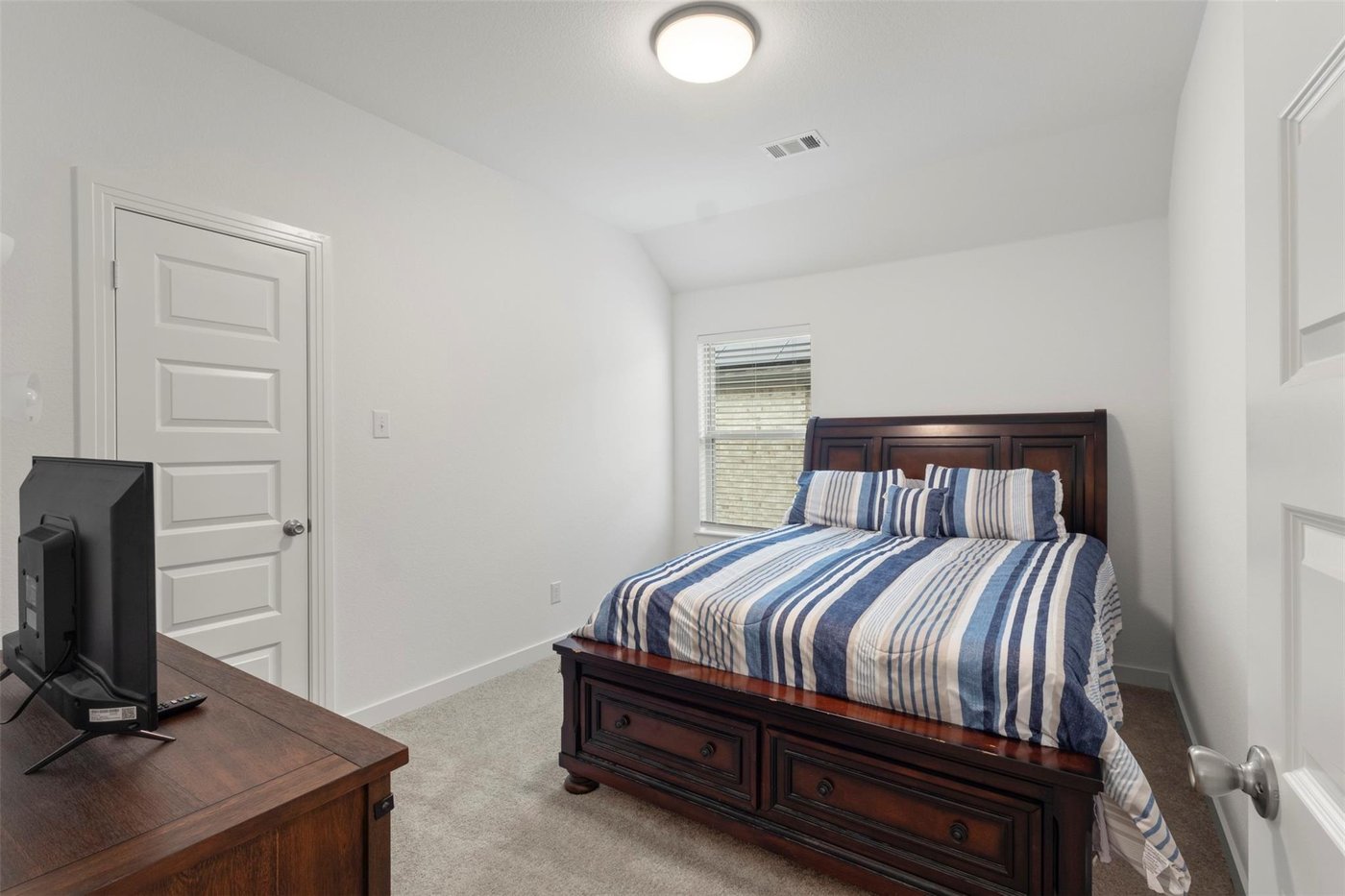 Second bedroom with a walk-in closet at 1848 Coronet Ave, Aubrey