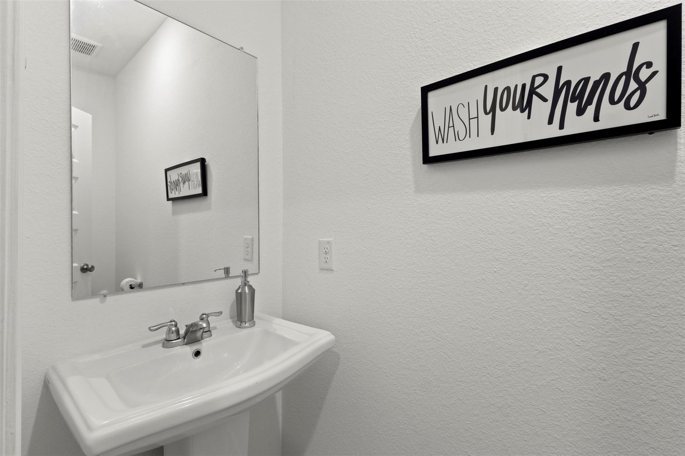 Convenient powder room at 1848 Coronet Ave, Aubrey, TX