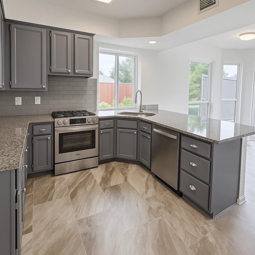 Gourmet kitchen with stainless steel appliances and an island at 2009 Antwerp, Plano
