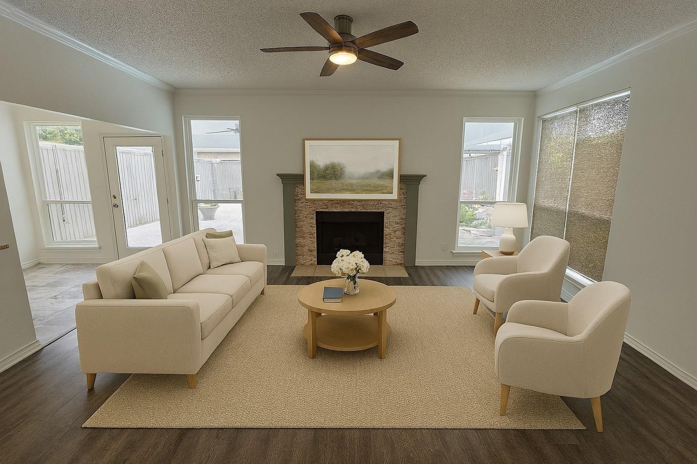 Family room with a fireplace and wood look flooring at 2009 Antwerp, Plano
