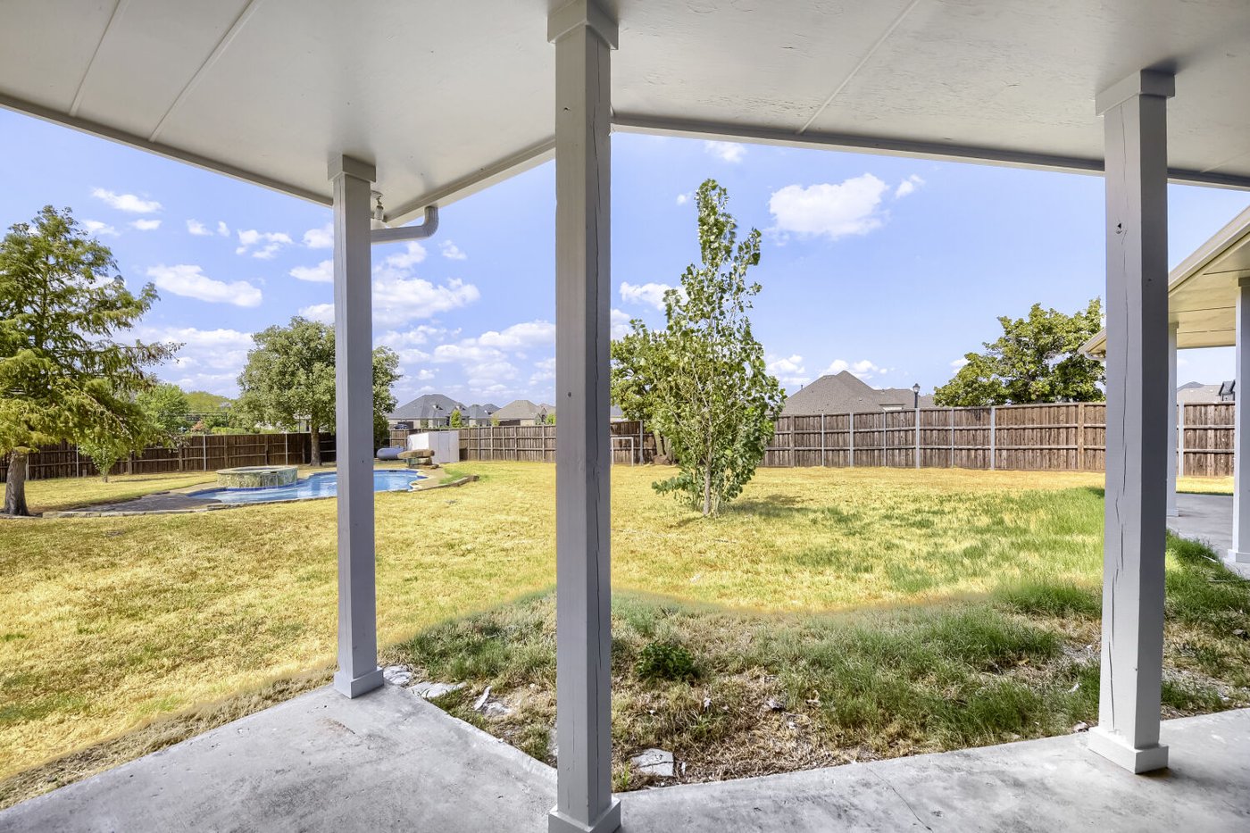 Backyard pool with a diving rock on over 1.5 acres at 201 N Garza Rd, Shady Shores