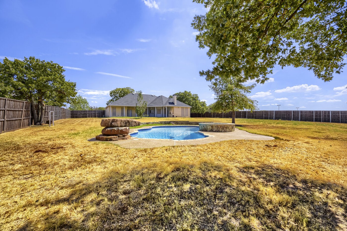 Expansive fenced backyard at 201 N Garza Rd, Shady Shores