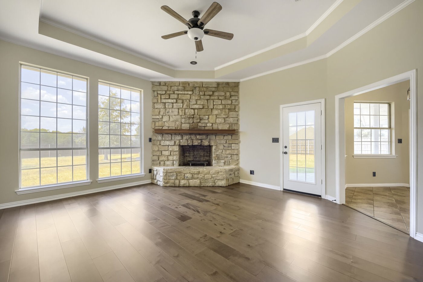 Bright living area with new flooring at 201 N Garza Rd, Shady Shores