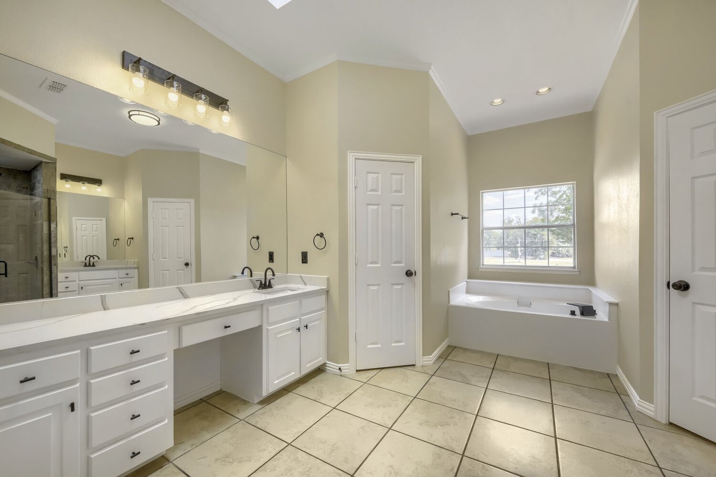 Updated primary bathroom at 201 N Garza Rd, Shady Shores