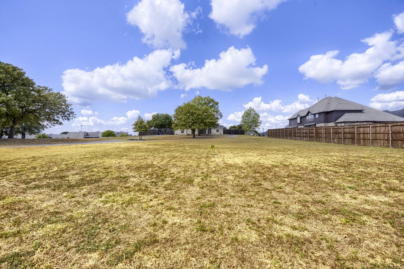 Open acreage grounds at 201 N Garza Rd, Shady Shores, TX