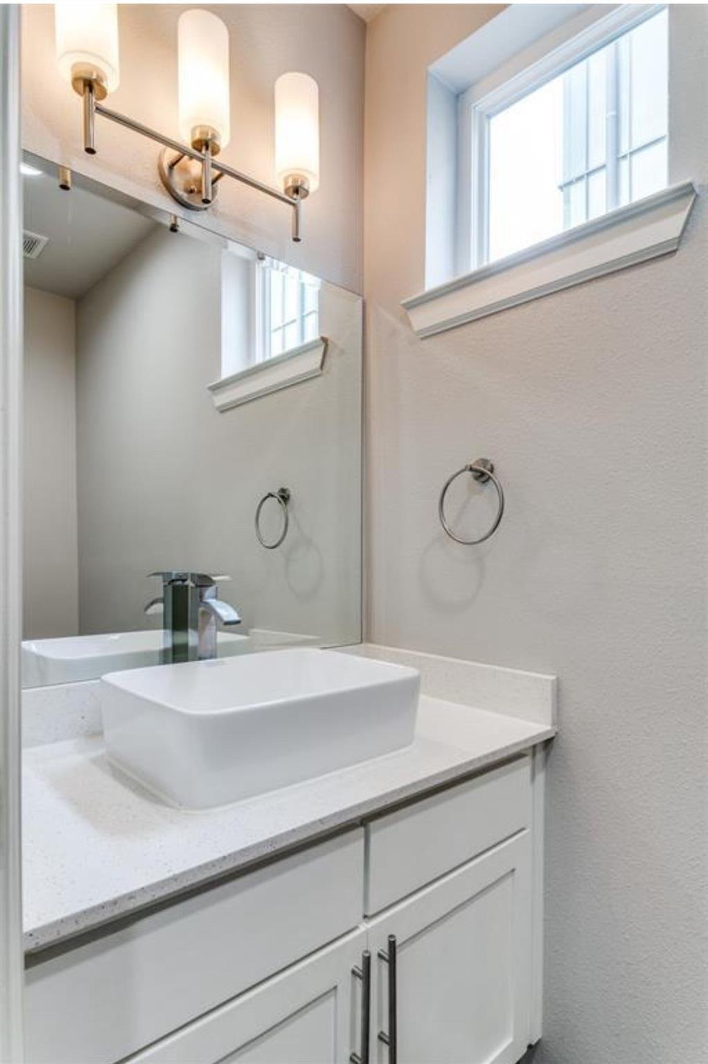 Full bathroom with a modern vessel sink vanity at 2016 N Fitzhugh Ave #104, Dallas