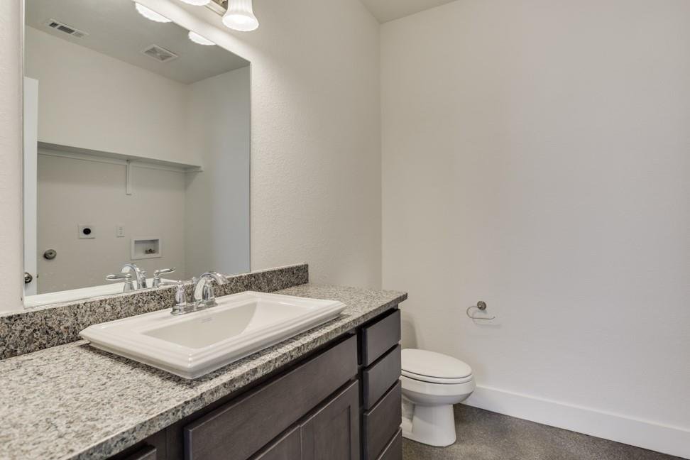 Downstairs half bath at 206 Topaz in New Braunfels