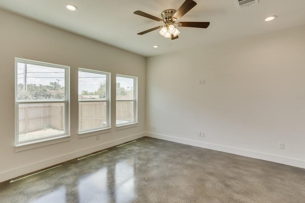 Living room with high ceilings and natural light at 206 Topaz, New Braunfels TX