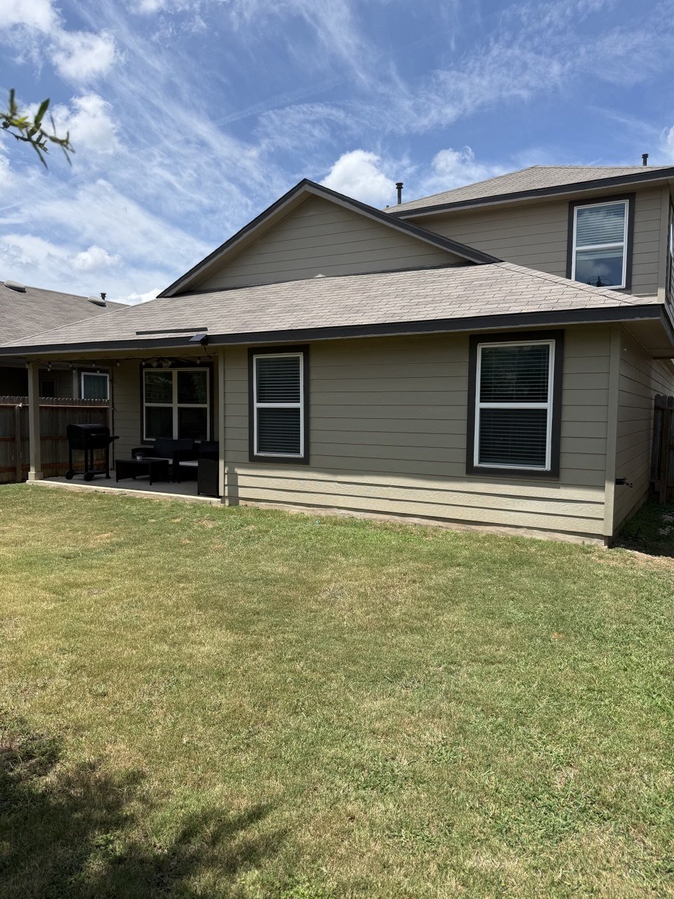 Backyard and covered patio at 22126 Backspin in San Antonio