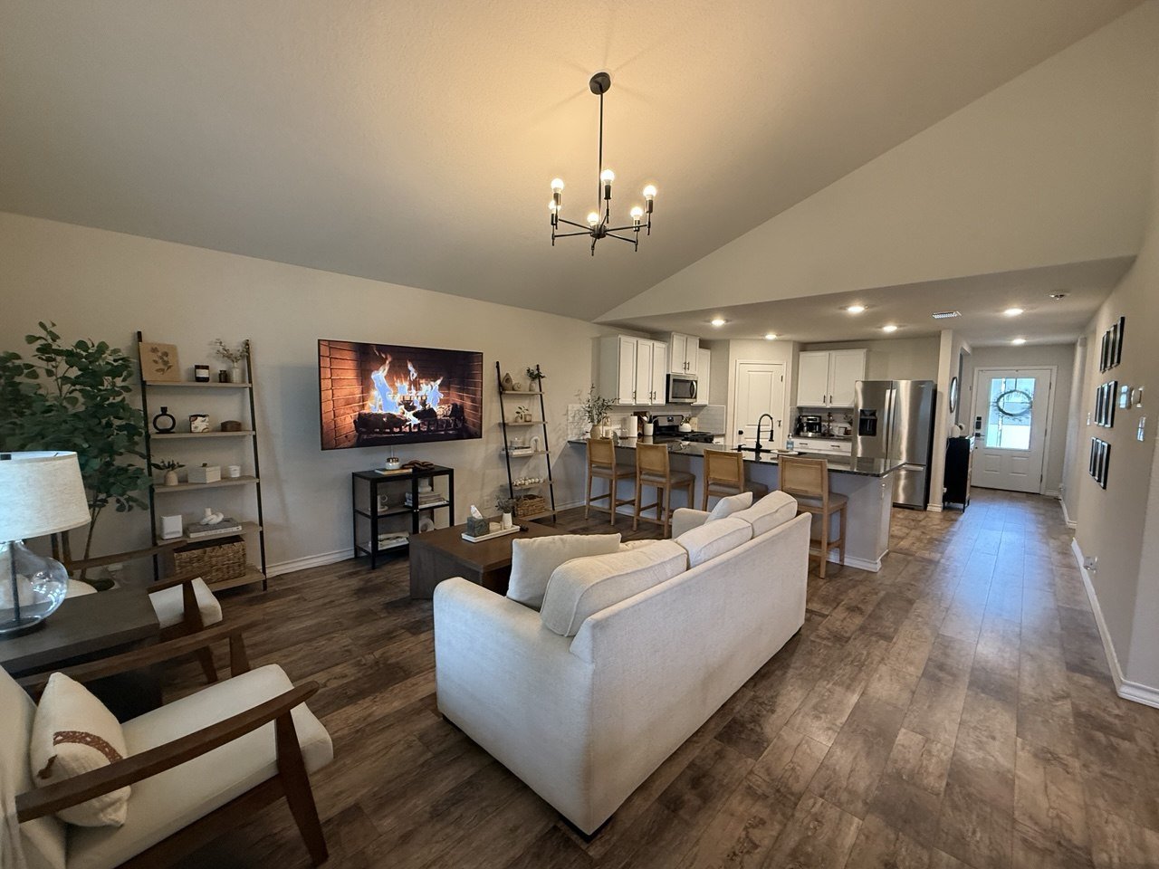 Bright open living area with wood look flooring at 22126 Backspin, San Antonio