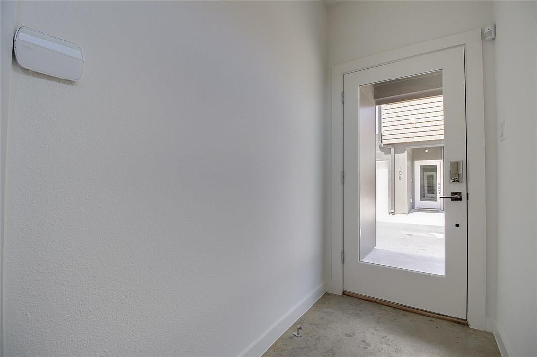 Entry foyer with natural light at 2310 N Carroll Ave Unit 105, Dallas