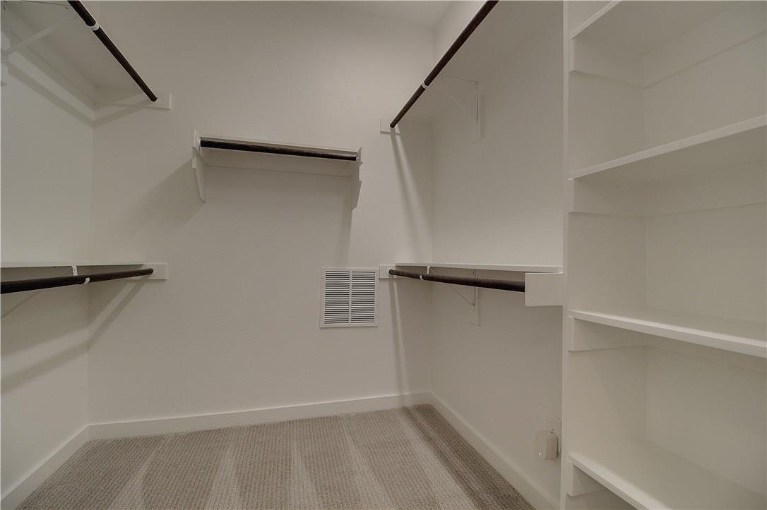 Massive walk in closet in the primary suite at 2310 N Carroll Ave Unit 105