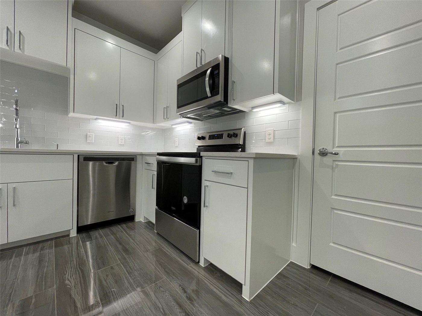 Kitchen with stainless steel appliances at 2417 N Winnetka Ave, Dallas