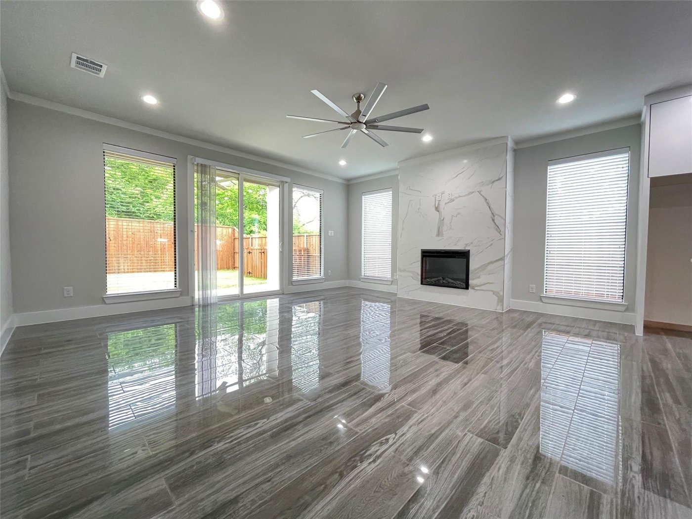 Bright living area open to the kitchen at 2417 N Winnetka Ave, Dallas