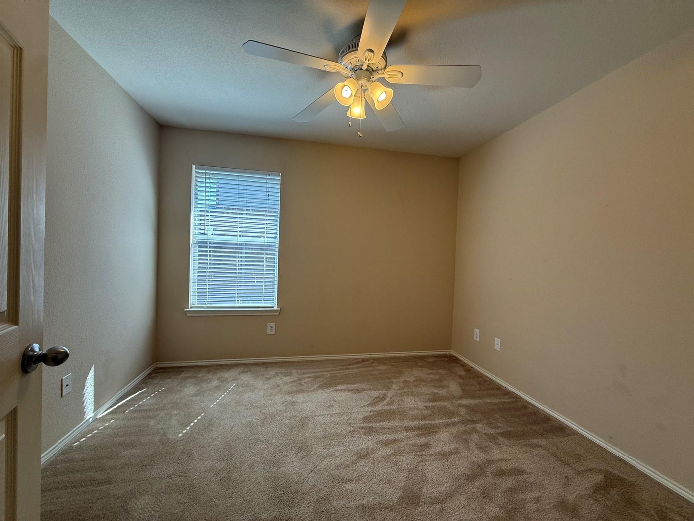 Fourth bedroom with carpet at 3605 Cottonwood Rd, Melissa, TX