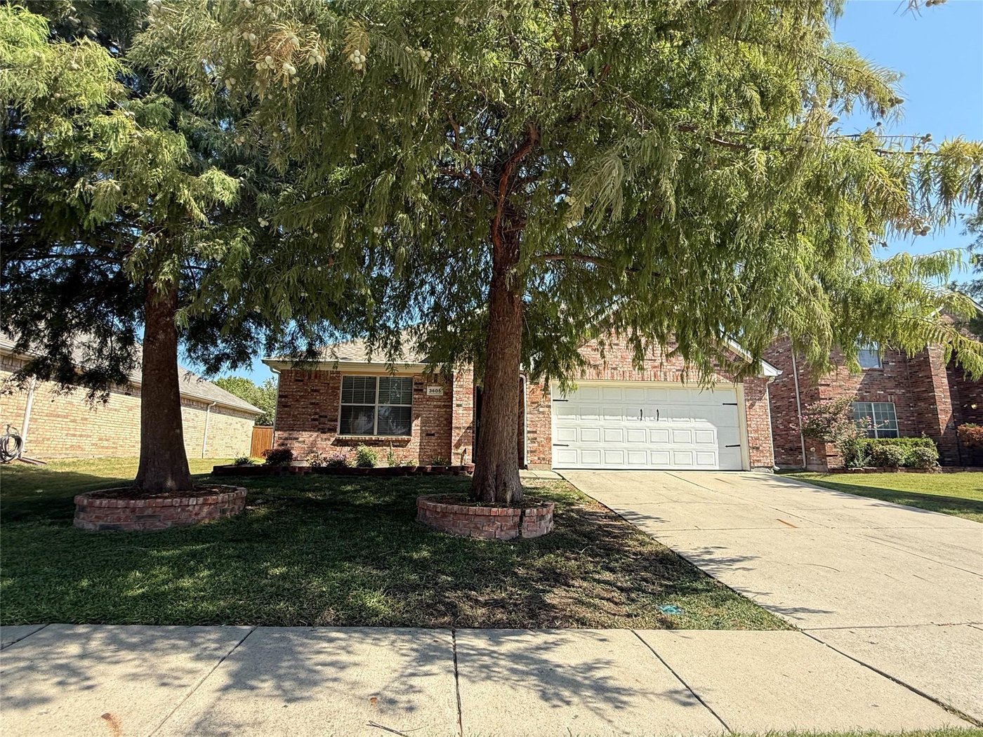 Front exterior of 3605 Cottonwood Rd, a single story brick home for lease in Melissa, TX
