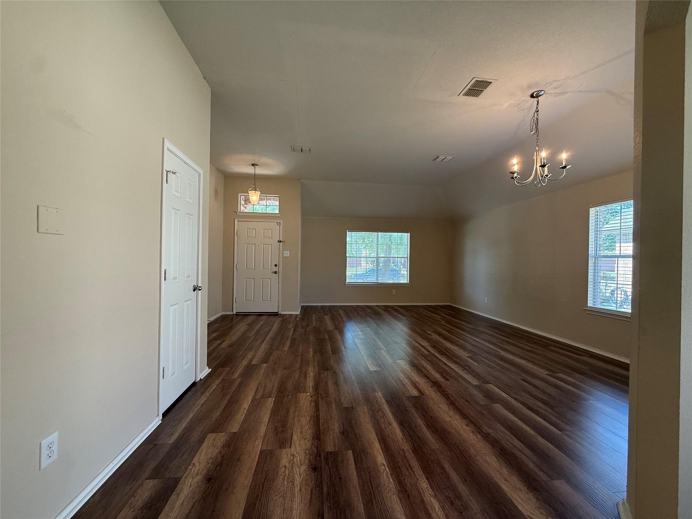Spacious living room with wood look luxury vinyl flooring at 3605 Cottonwood Rd