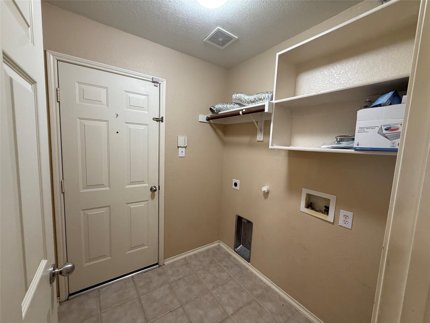 Separate utility and laundry room at 3605 Cottonwood Rd, Melissa