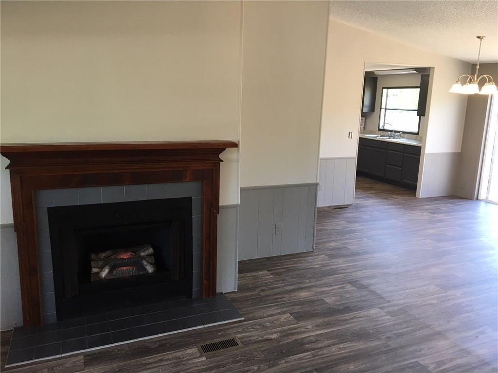 Fireplace with a wood mantel in the living room at 365 Darrell Rd, Roanoke
