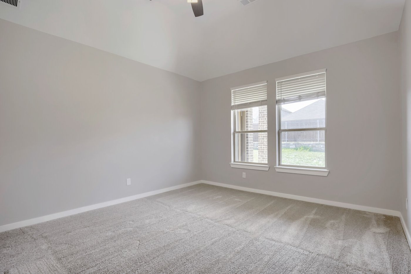 Spacious primary bedroom at 3925 Chesapeake Ln, Heartland, TX