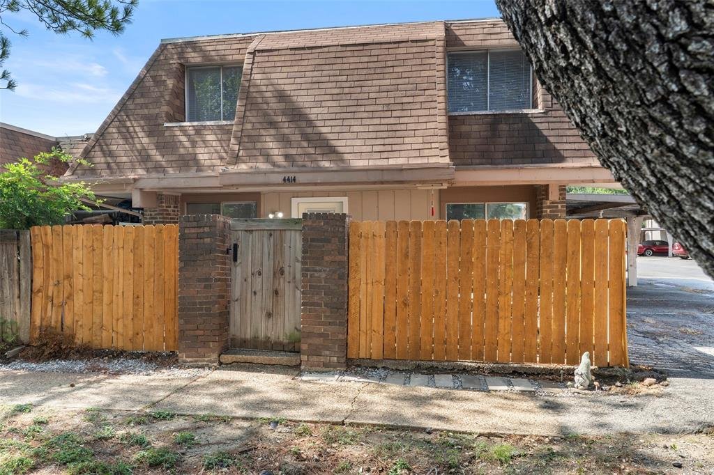 Front exterior of 4414 Westminster Dr, a two story townhouse for sale in Irving, TX