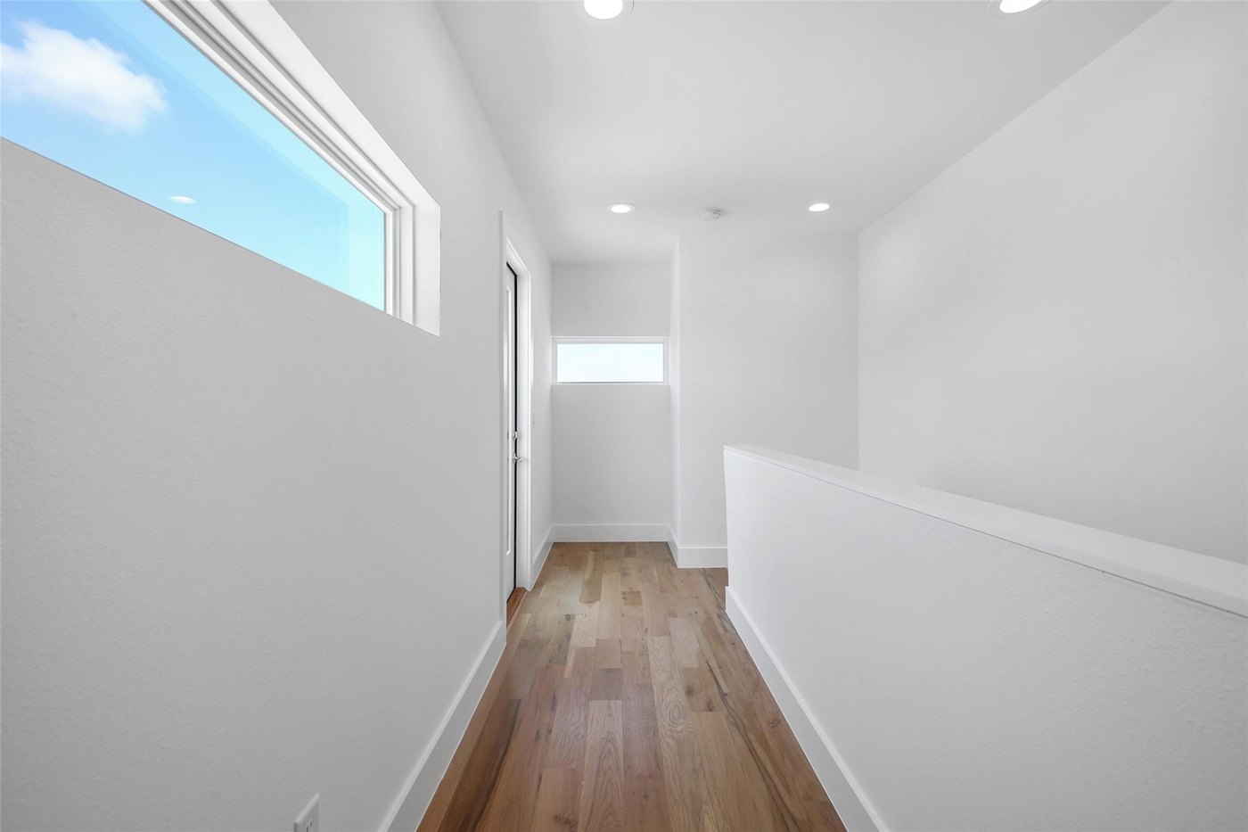 Interior hallway with wood floors at 4904 Lexington Ct, Dallas