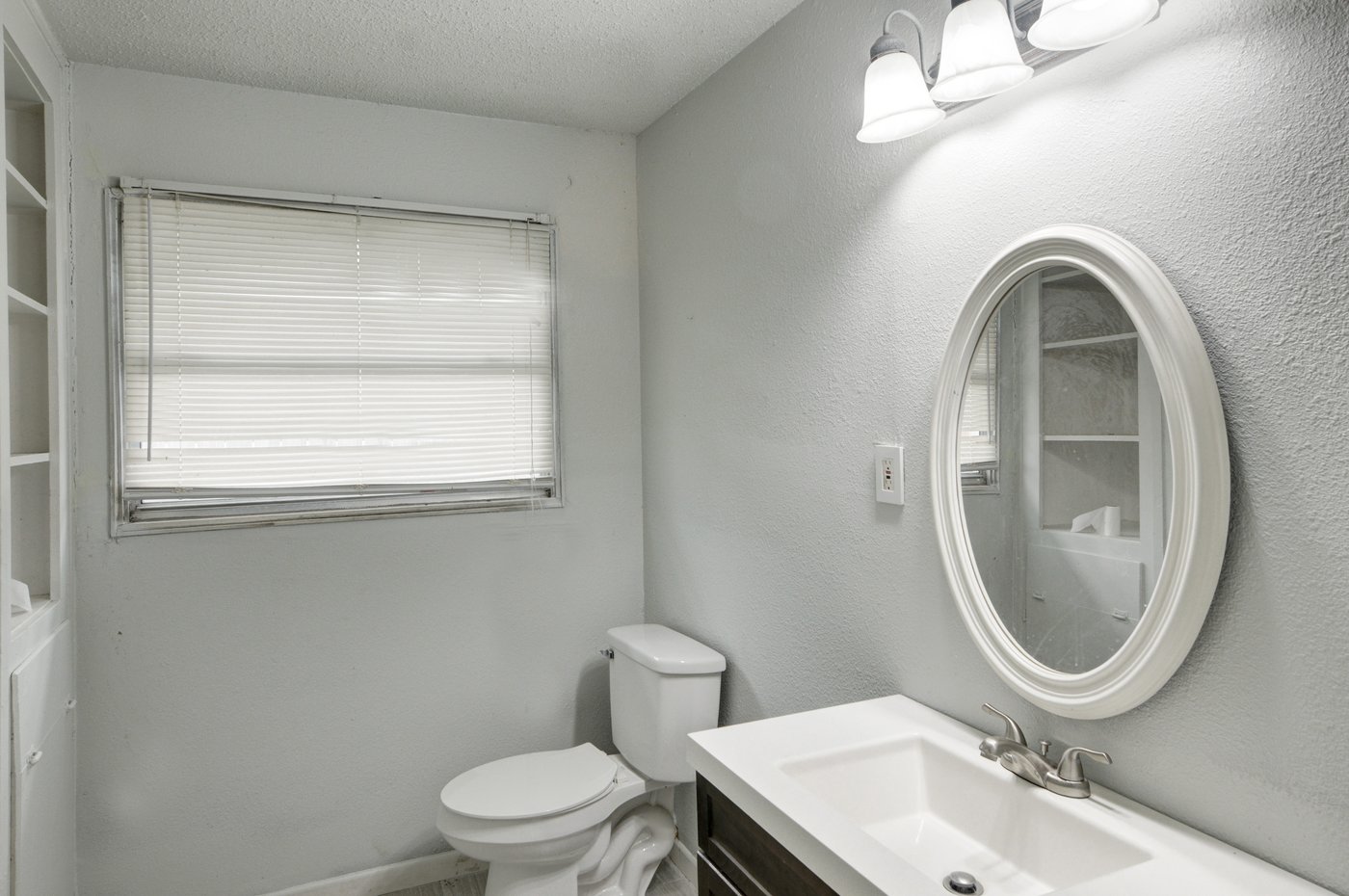 Refreshed full bathroom with a contemporary vanity at 5413 Wedgwood Dr