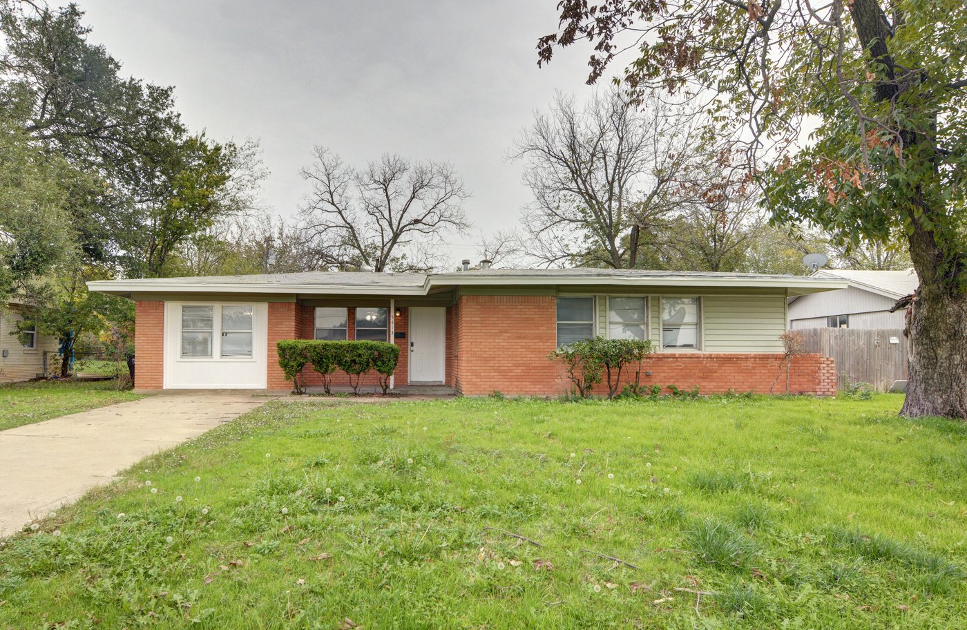 Front exterior of 5413 Wedgwood Dr, a single story brick home for lease in Fort Worth, TX