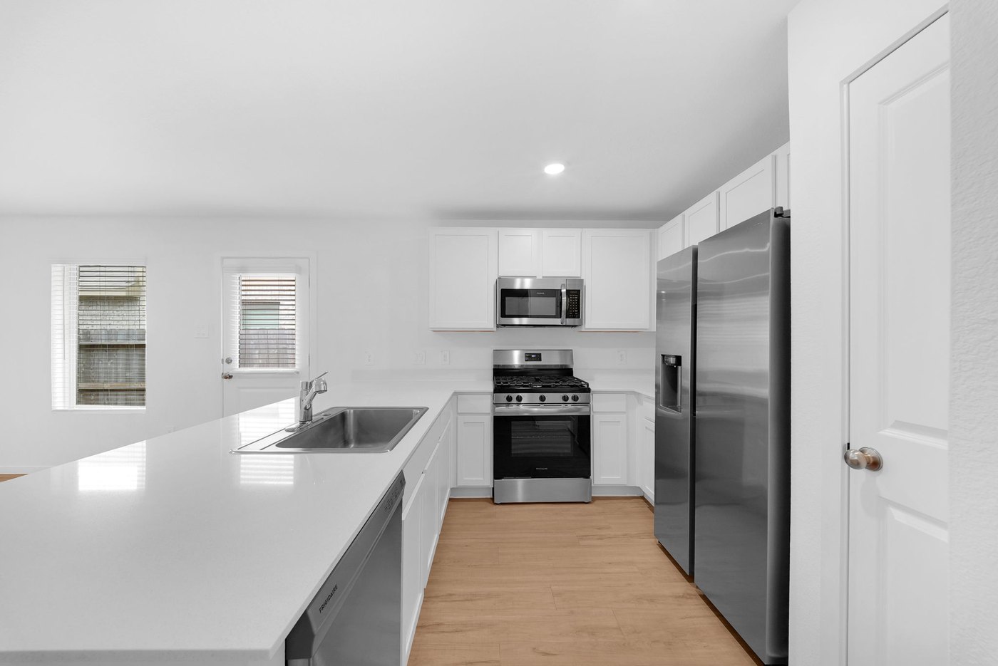 Kitchen with a center island and stainless steel appliances at 597 Falling Cave Dr, Willis