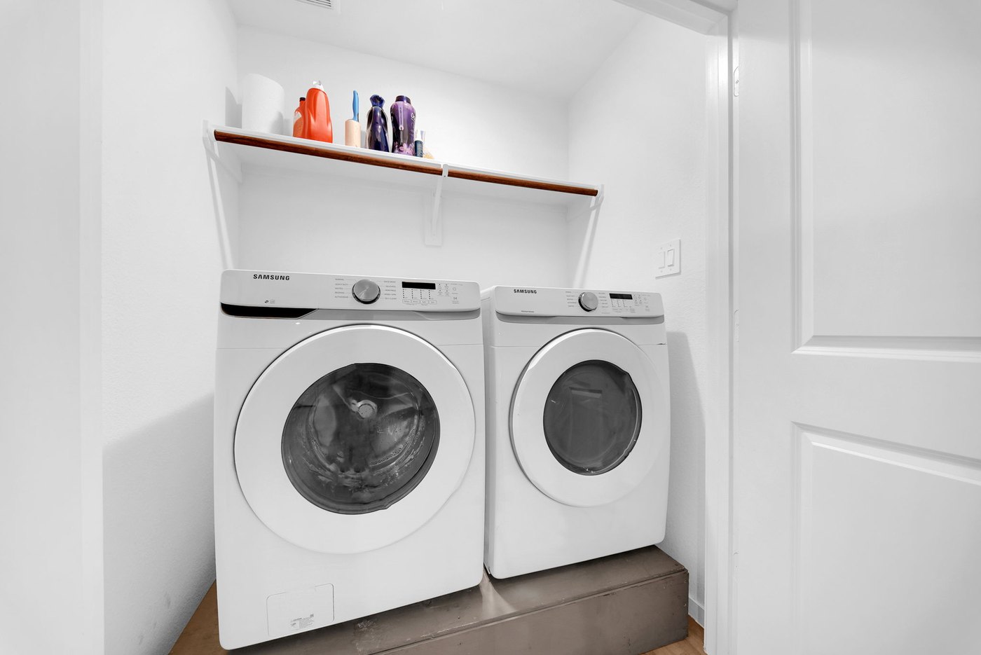 Laundry area with a full size washer and dryer included at 597 Falling Cave Dr, Willis