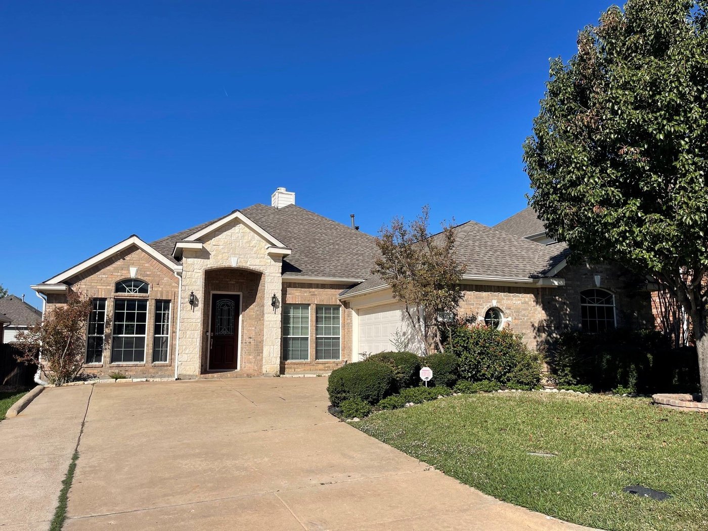 Brick front exterior and driveway at 6505 Josephine Dr, Arlington