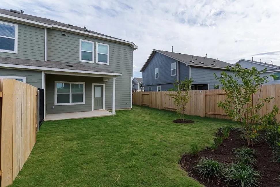 Fenced backyard at 7104 Spotted Leaf Way, Del Valle