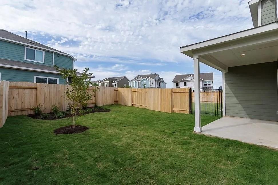 Covered back porch at 7104 Spotted Leaf Way, Del Valle