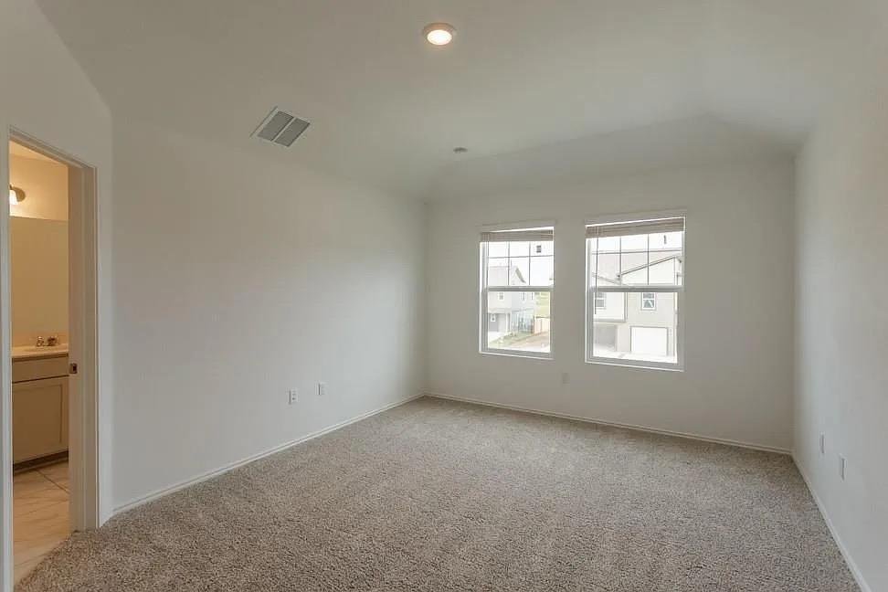 Primary bedroom at 7104 Spotted Leaf Way, Del Valle