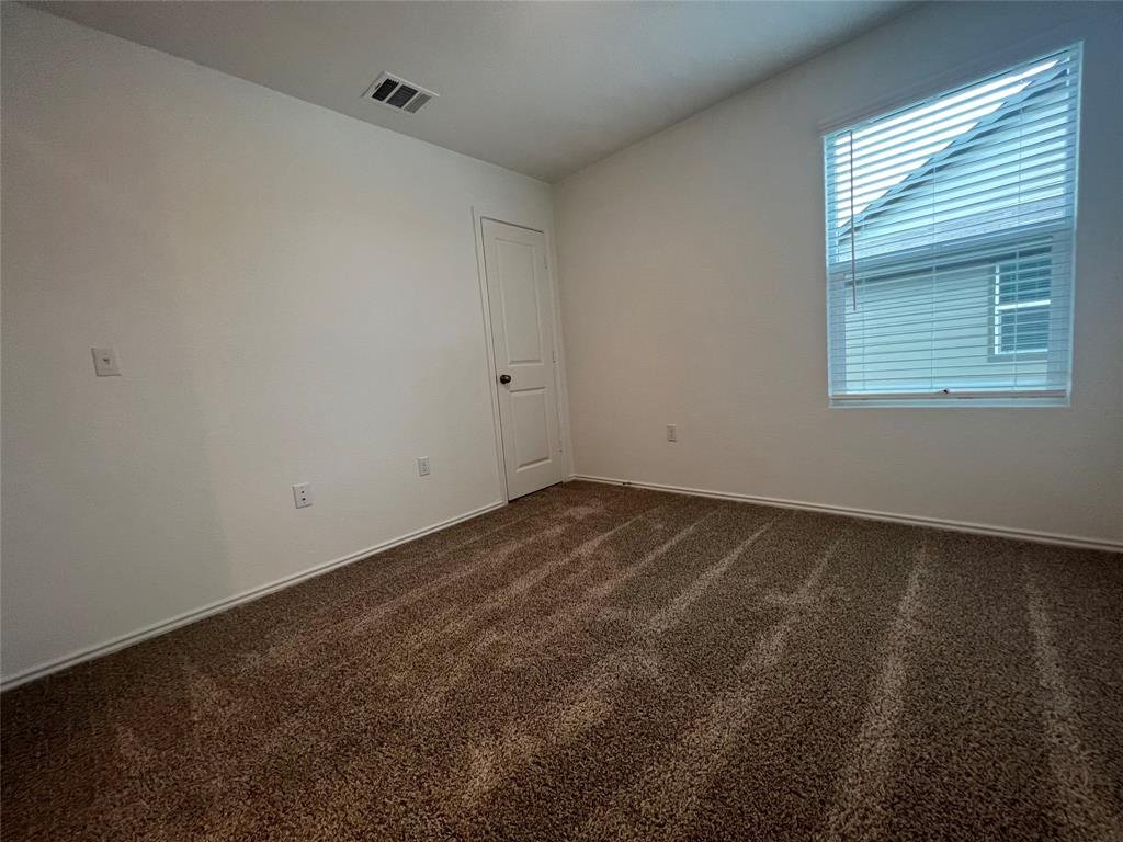 Second bedroom upstairs at 7724 Spotted Leaf Way in Del Valle