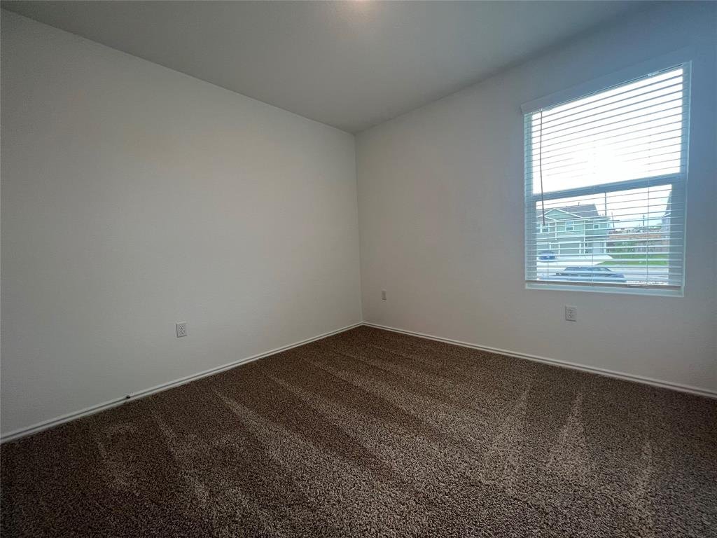 Third bedroom upstairs at 7724 Spotted Leaf Way, Del Valle TX