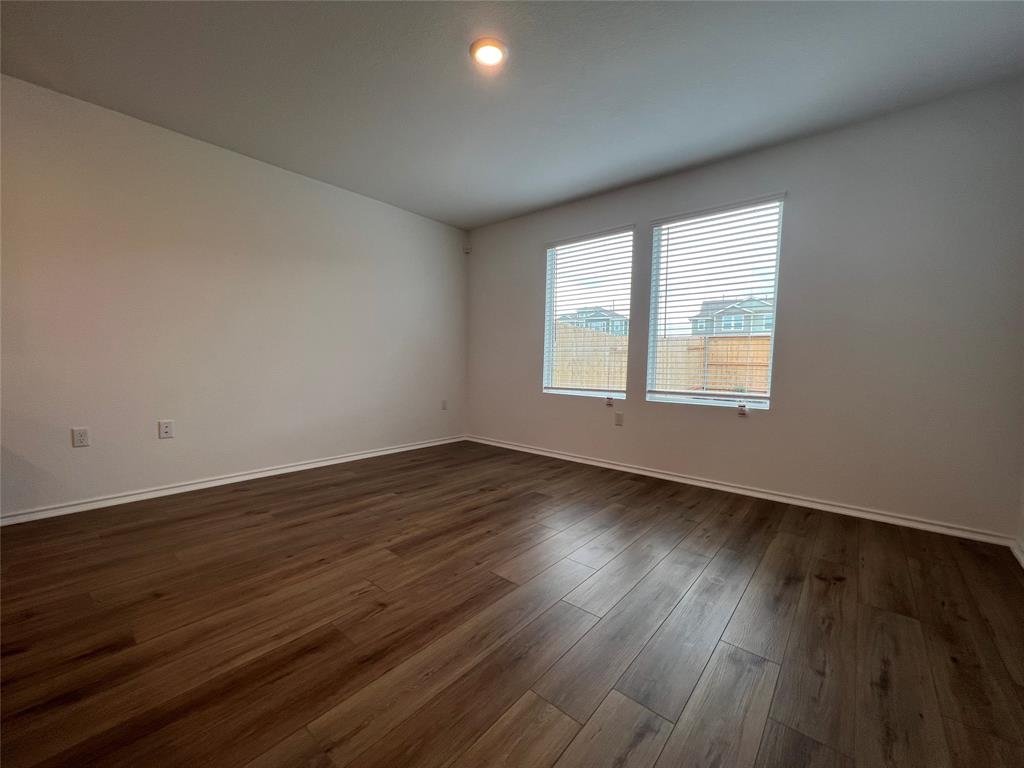 Dining area on the open main floor at 7724 Spotted Leaf Way, Del Valle