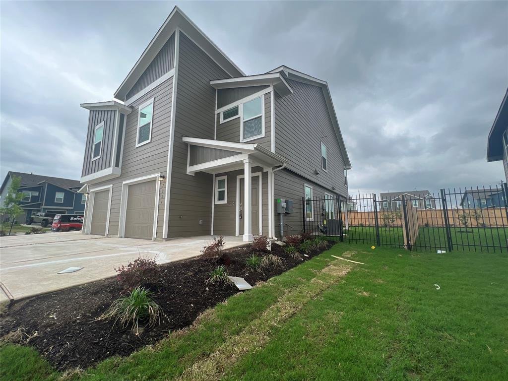 Exterior of 7724 Spotted Leaf Way, a two story townhouse for lease in Del Valle, Texas