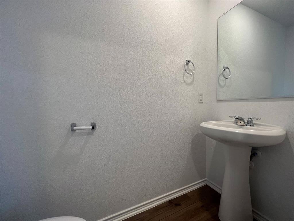 Downstairs half bath at 7724 Spotted Leaf Way, Del Valle