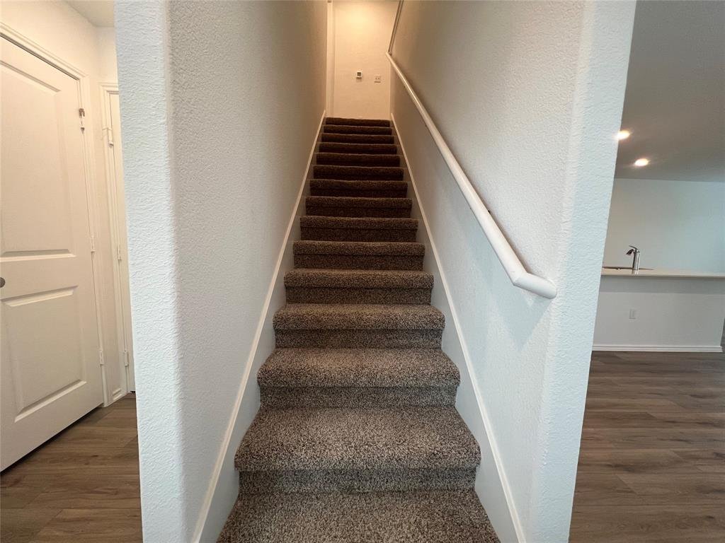 Staircase to the second floor bedrooms at 7724 Spotted Leaf Way, Del Valle